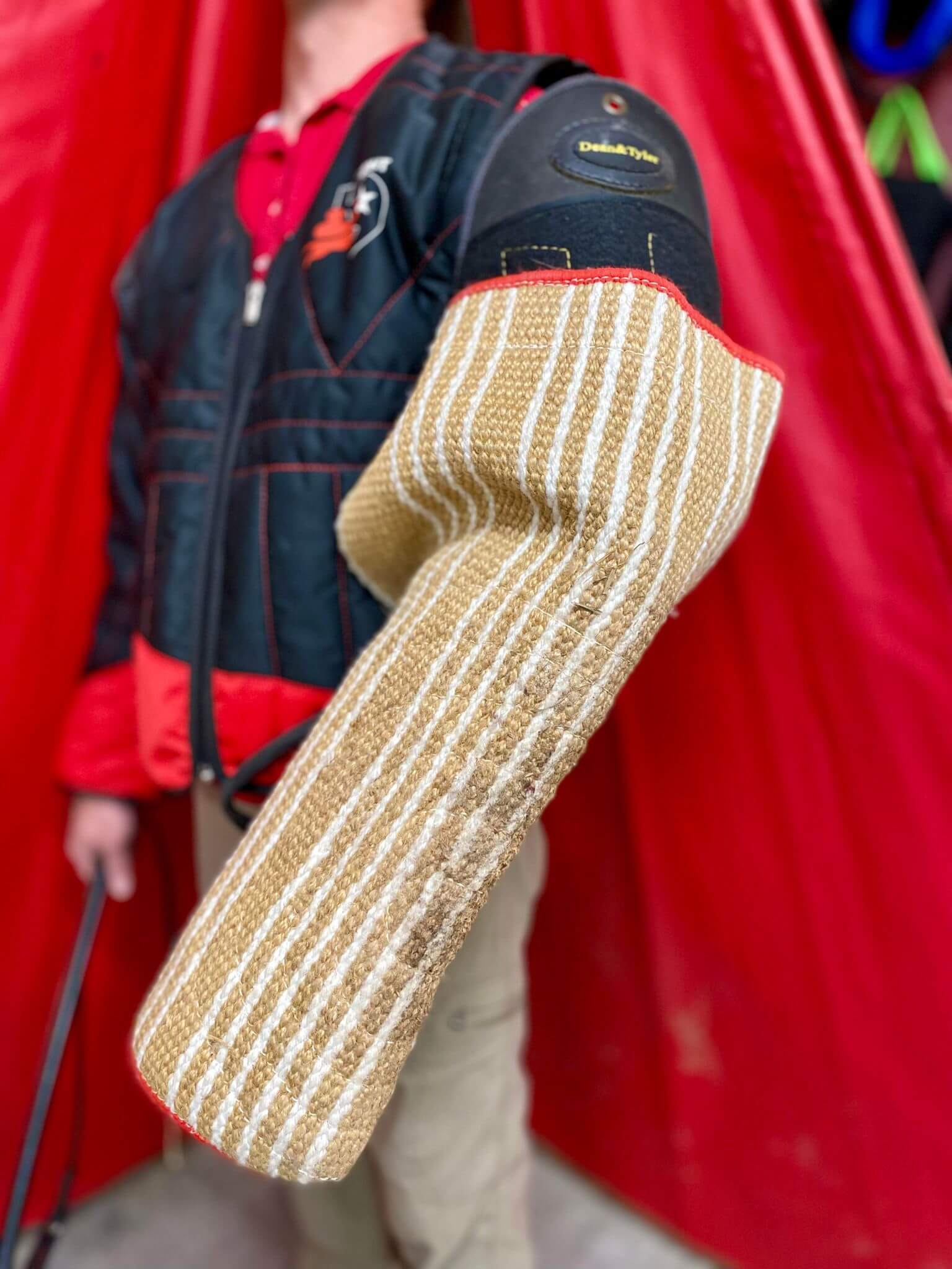 man wearing protective dog training gear
